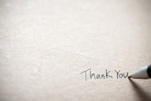 Hand writing thank you note